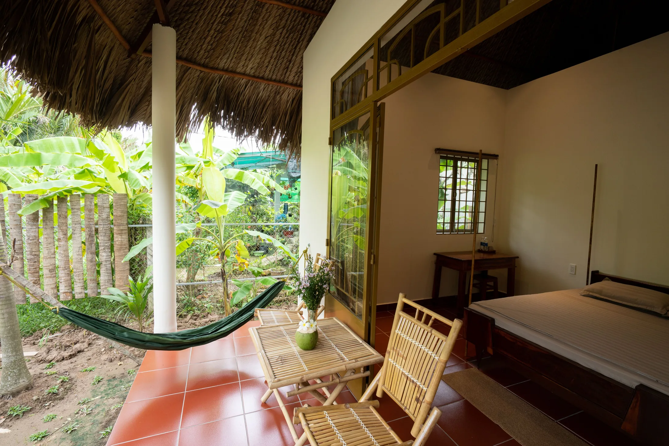 Bamboo table and hammock on Coconut Bliss veranda