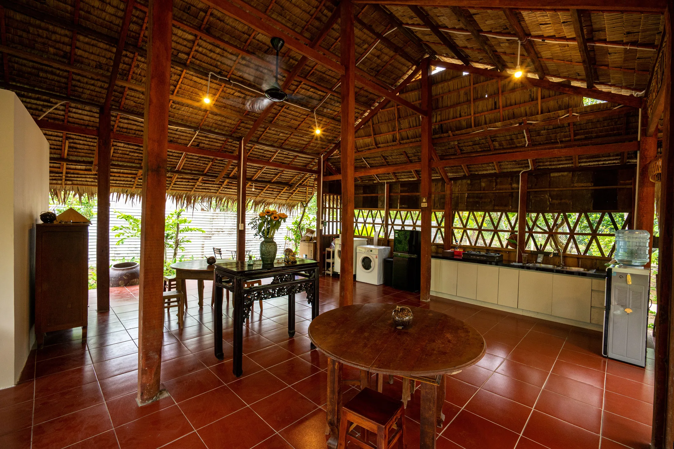 Shared kitchen and dining space at Mango Home